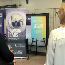 researchers and Lawson Leads sign