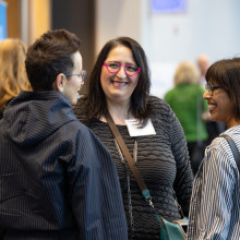 Three women speaking