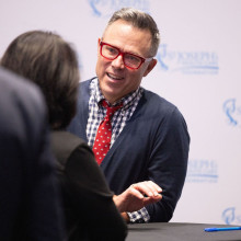 Timothy Caulfield smiles as he greets guests