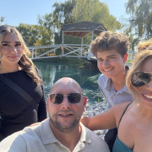 A family smiles for the camera