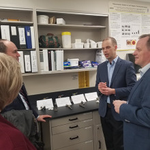 Dr. Brent Lanting showing samples of implants