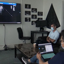 Research team looping at ultrasound image on screen