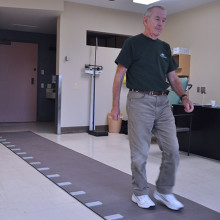 Study participant walking on the gait mat