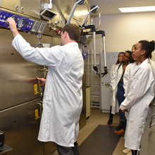 Dr. Justin Hicks provides tour of the Cyclotron and PET Radiochemistry Facility