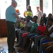Dr. Gregor Reid presents to students in South Africa